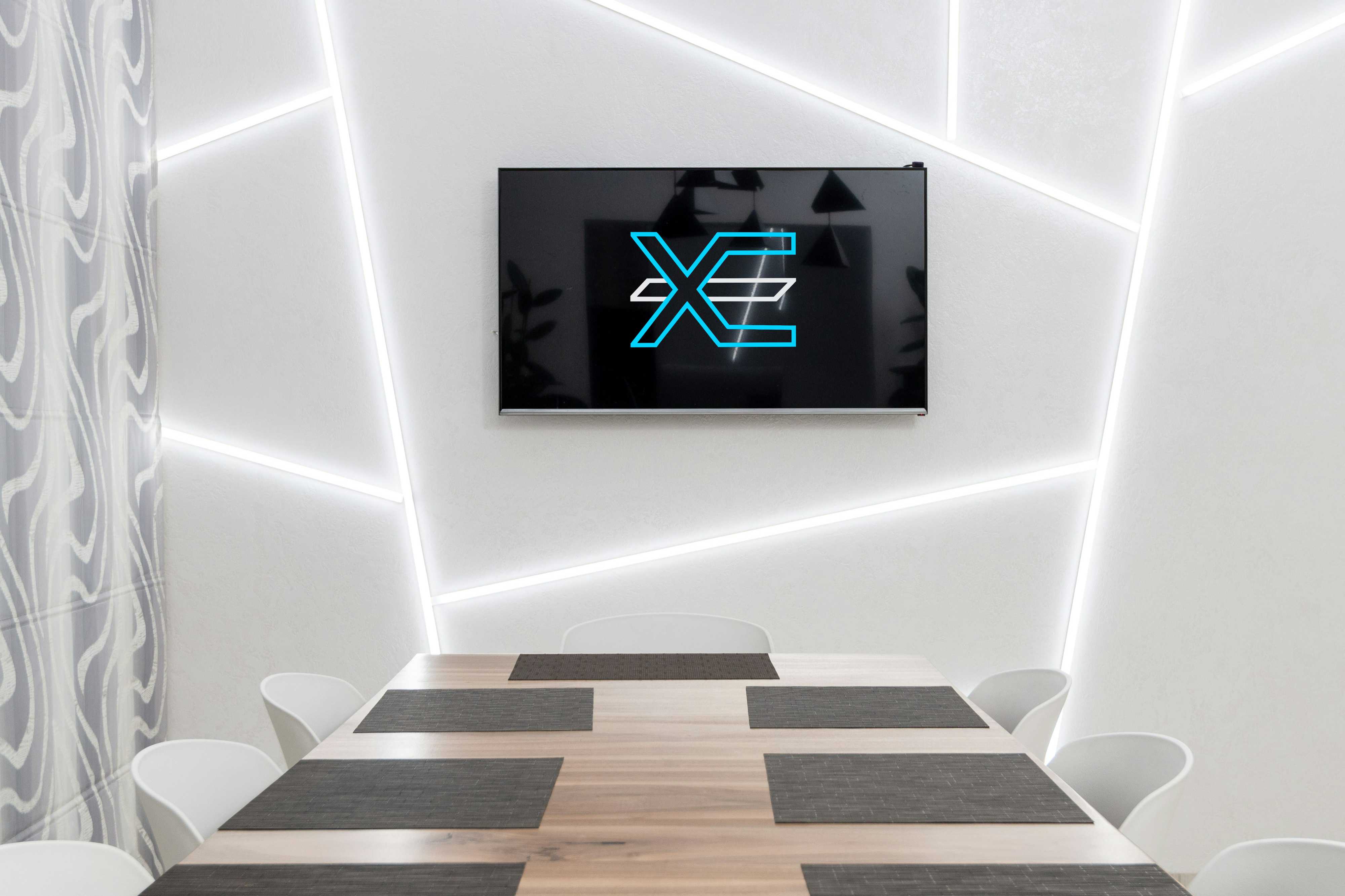 Modern office space with Xeede logo display